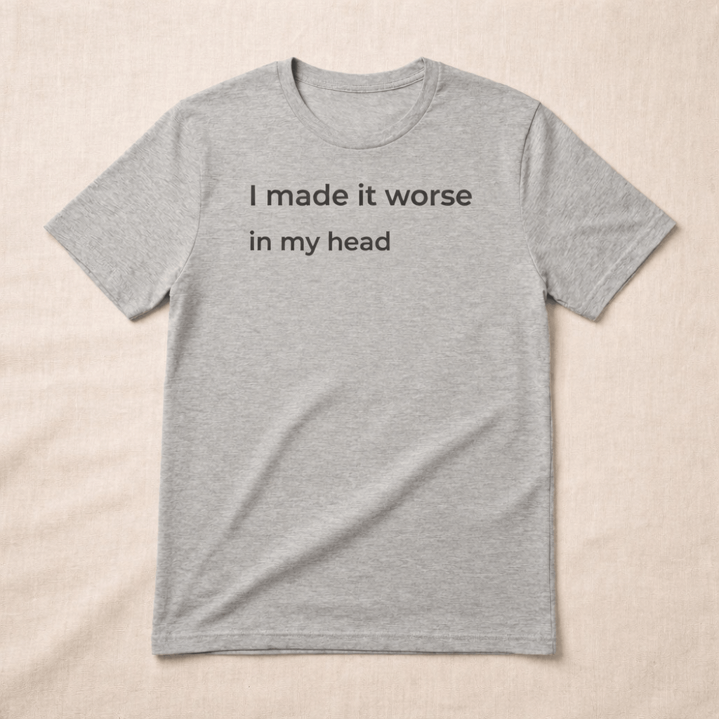 Minimalist t-shirt with “I made it worse in my head” text, soft neutral aesthetic