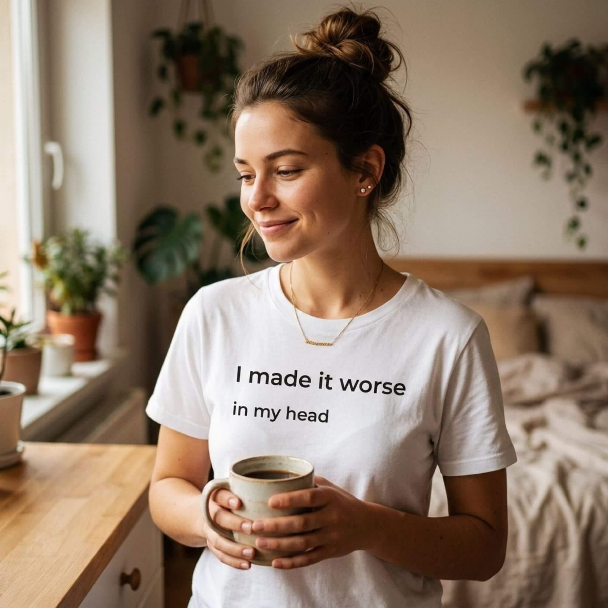 woman holding coffee in i made it worse in my head grey tee — text & tone