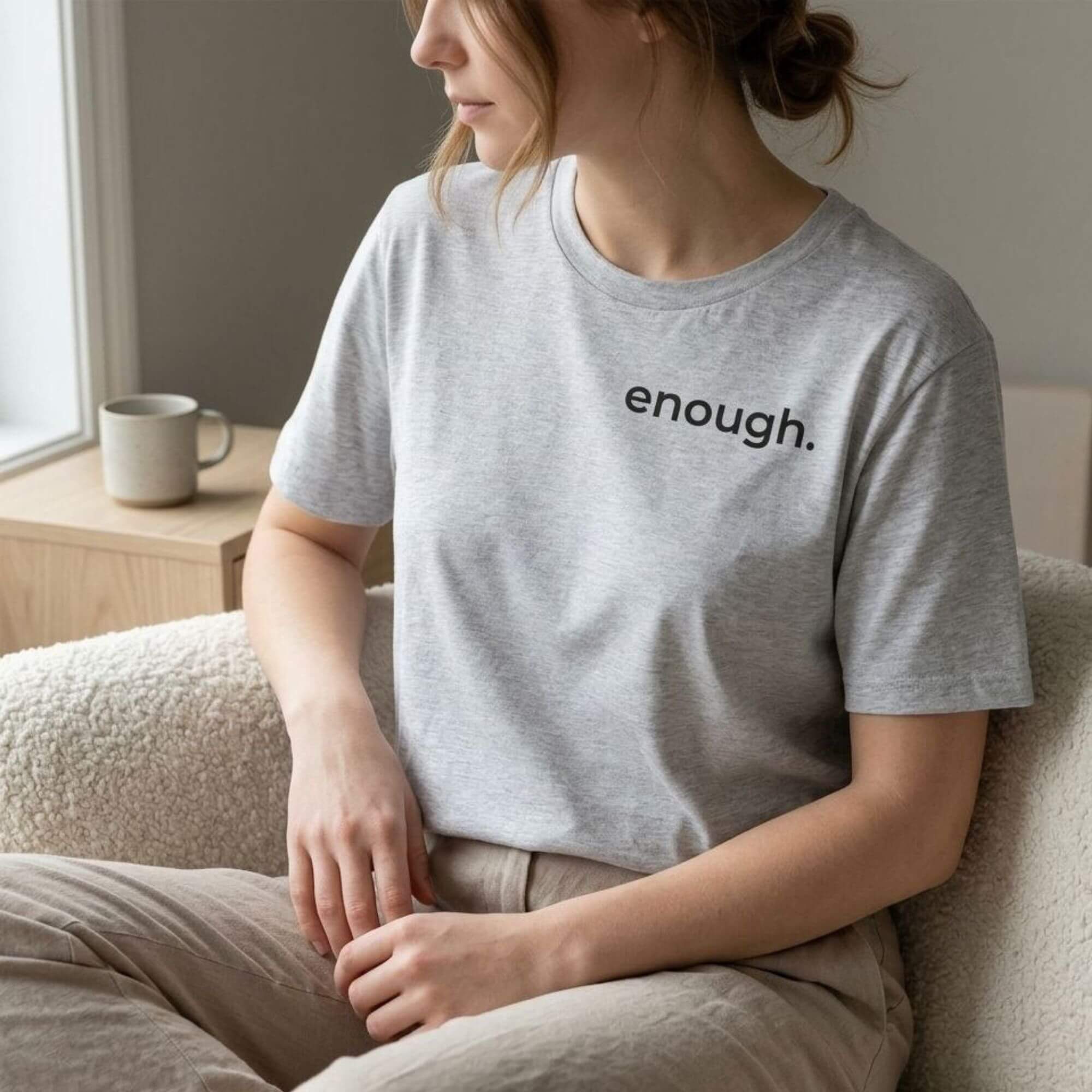 woman wearing enough t-shirt gray minimalist lifestyle calm aesthetic outfit