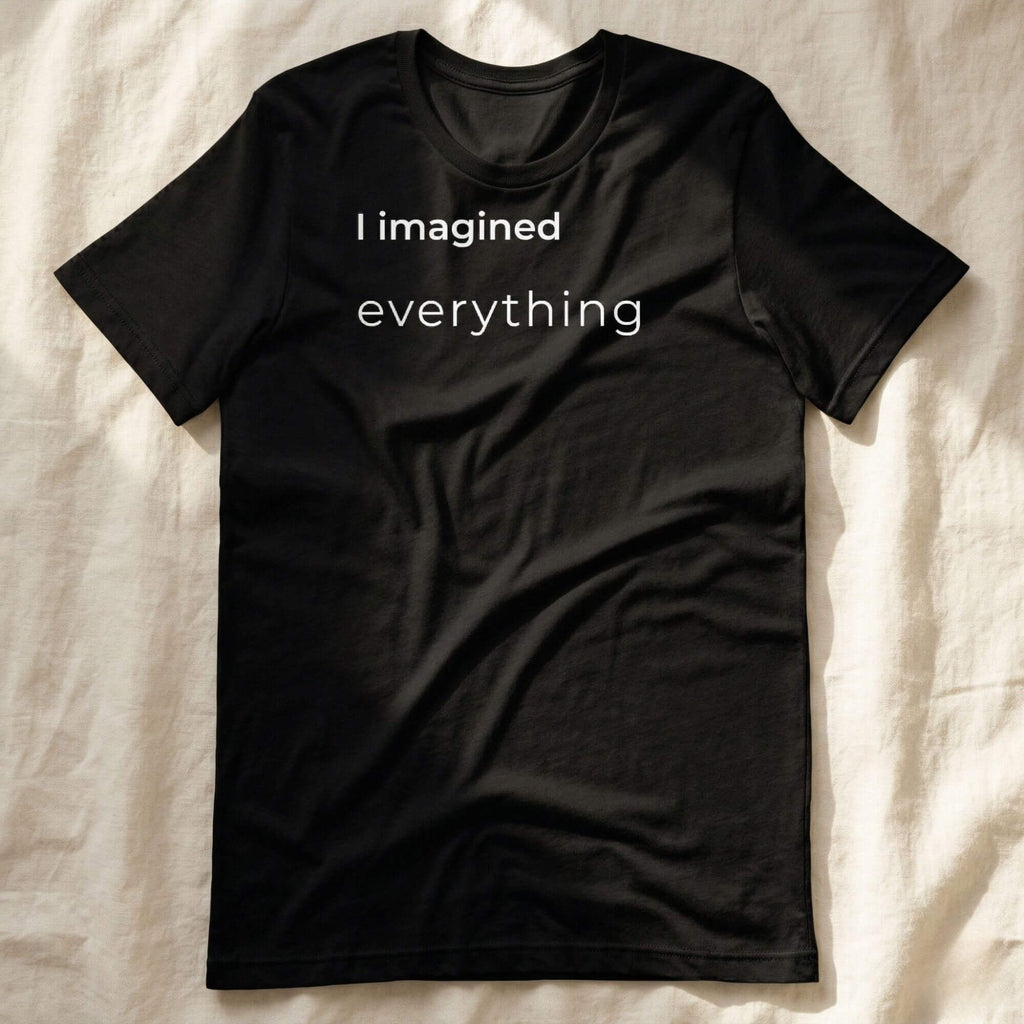 Black t-shirt with "I imagined everything" text, minimalist design
