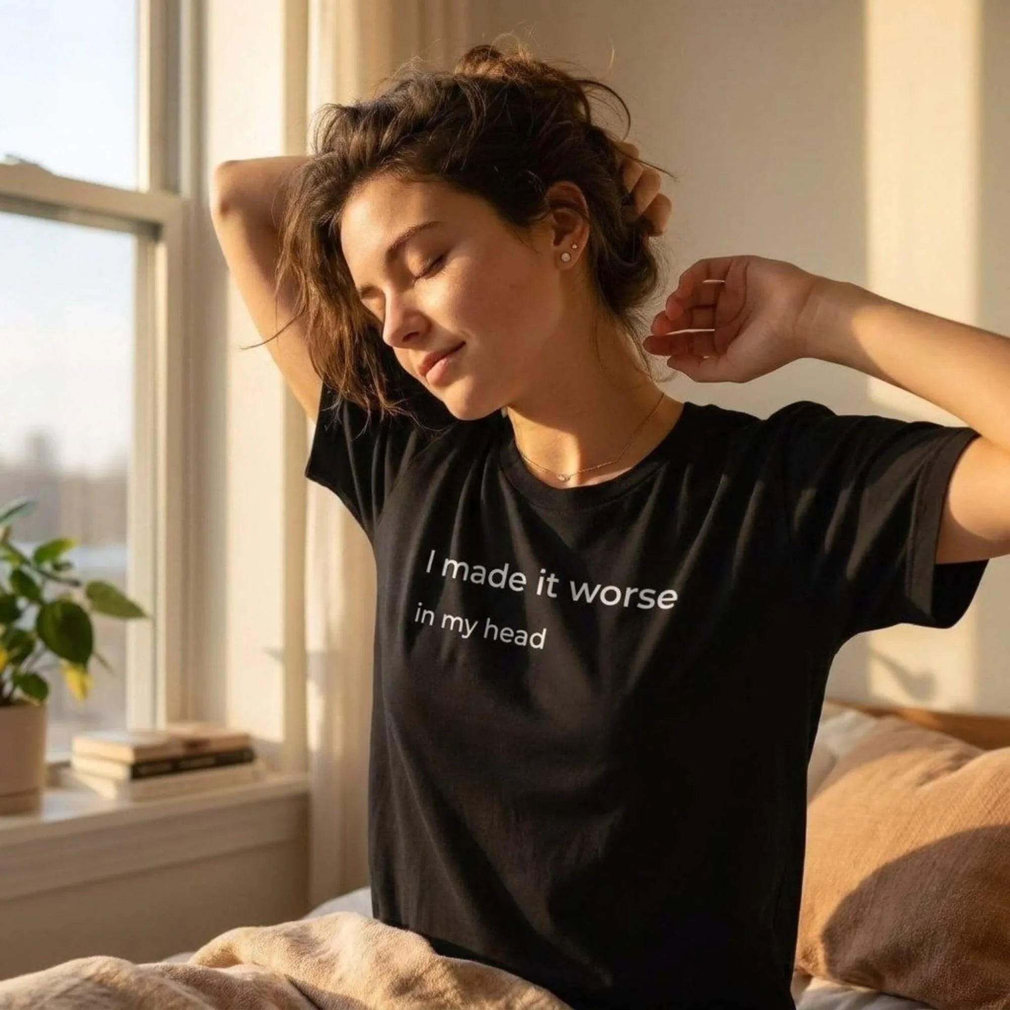 woman stretching in i made it worse in my head black t-shirt — morning — text & tone