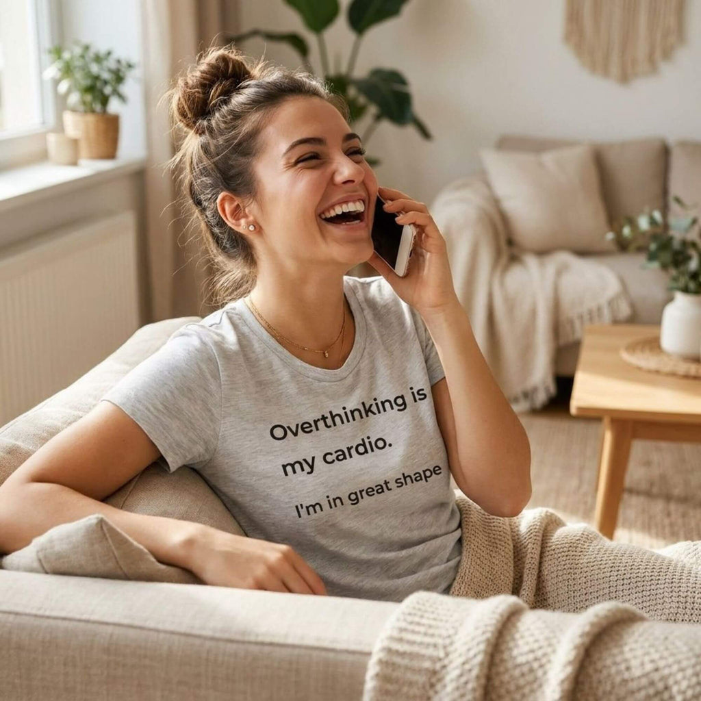 woman laughing on phone in overthinking is my cardio grey tee — text & tone