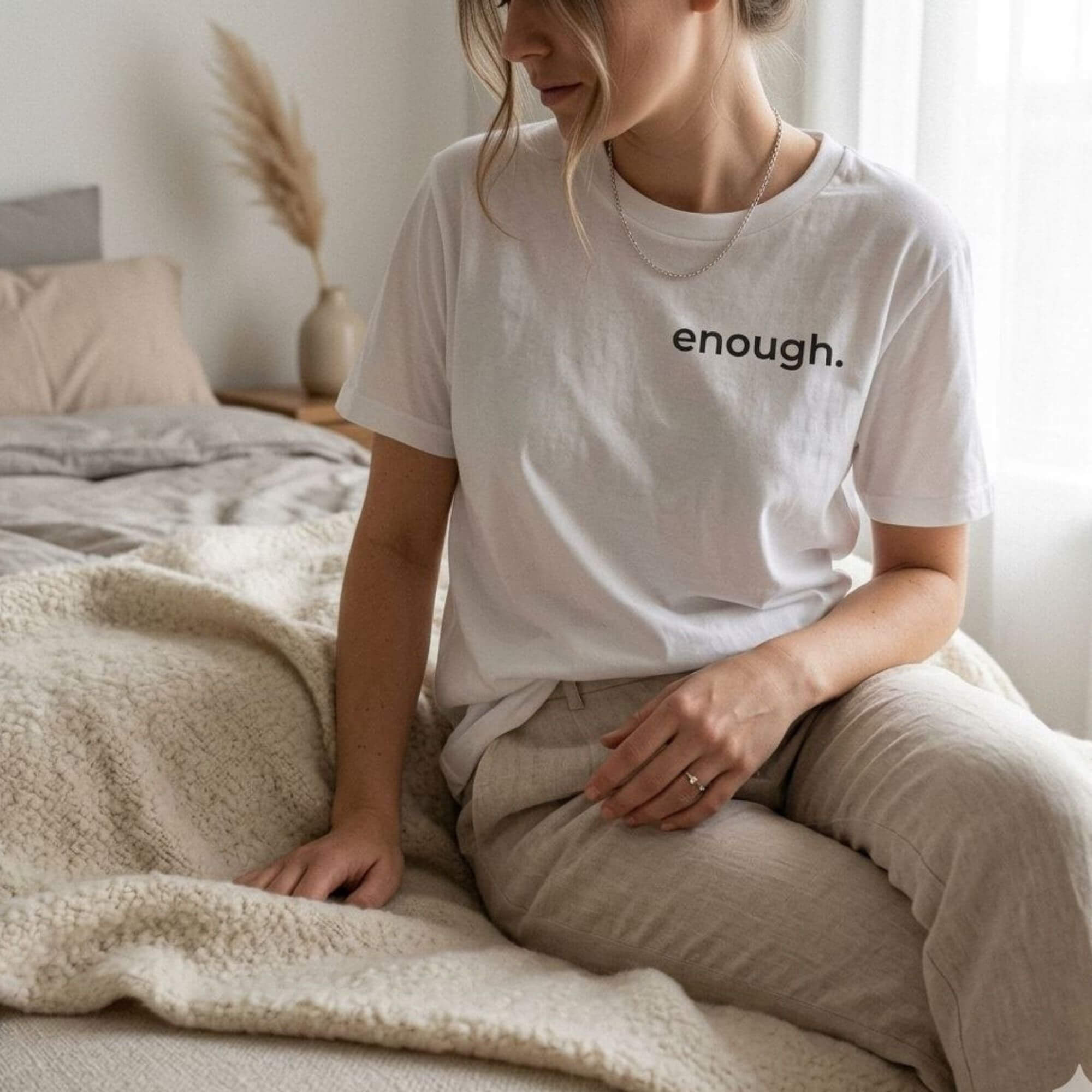 cozy lifestyle woman wearing enough t-shirt self care aesthetic minimalist clothing
