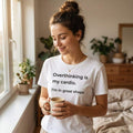 woman in overthinking is my cardio grey slogan tee holding mug — text & tone