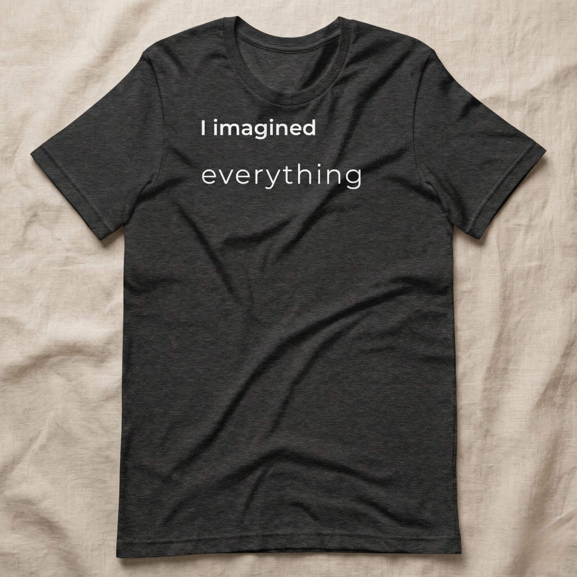 Dark grey T-shirt with simple text print "I imagined everything"