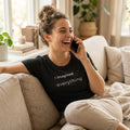 woman laughing on phone in i imagined everything dark grey tee — text & tone